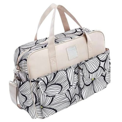 sac pour bebe creme avec motif floral et poches latérales