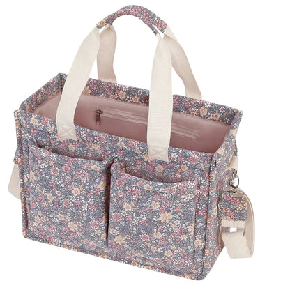 Sac pour bebe fleuri avec compartiment central spacieux et poches avant pratiques