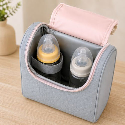 Sac pour deux biberons rose et gris ouvert avec deux biberons et bandes élastiques de maintien