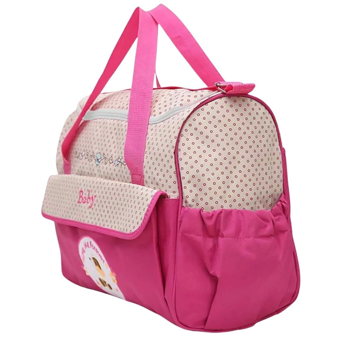 Sac pour la maternité rose posé de profil, poches latérales visibles