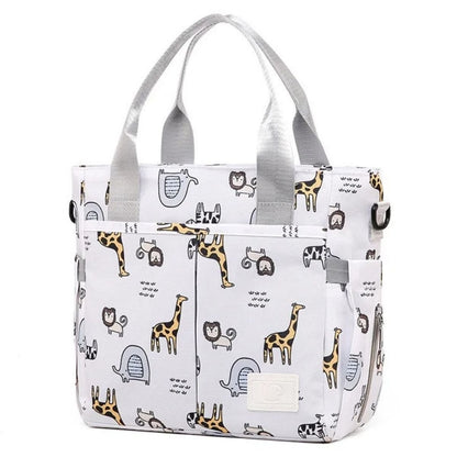 Sac pour maternité safari doux avec imprimé girafes, lions et éléphants
